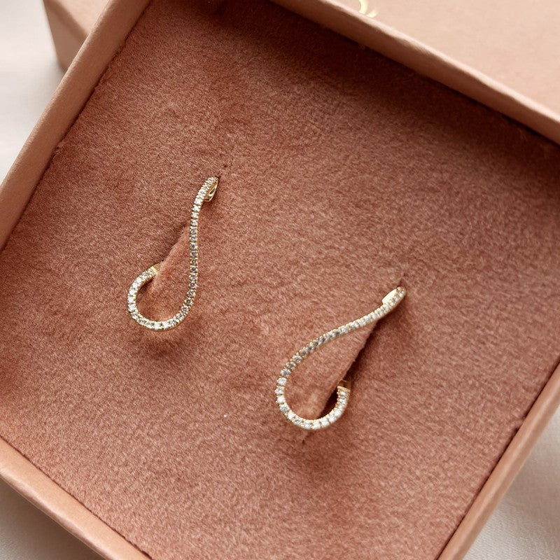 Dazzling 14 kt. creoler 0,24 H-W/SI diamanter a