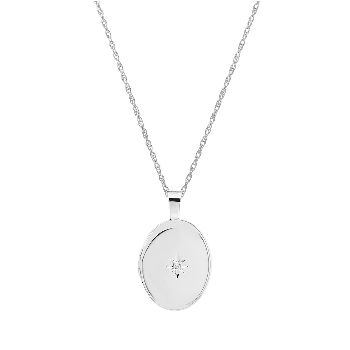 Siersbøl medaljon i rhodineret sølv med brillant på 0,01 ct, klassisk design med diamant på forsiden