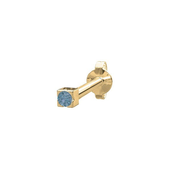 Nordahl Andersen ørestik i 14 kt. guld med blå topaz – diskret piercing med sommerfuglelås