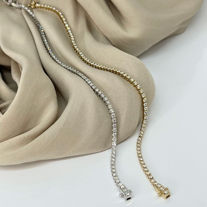 Dazzling - 14 kt. Tennis-armbånd med i alt 0,95 H-W/SI diamanter c