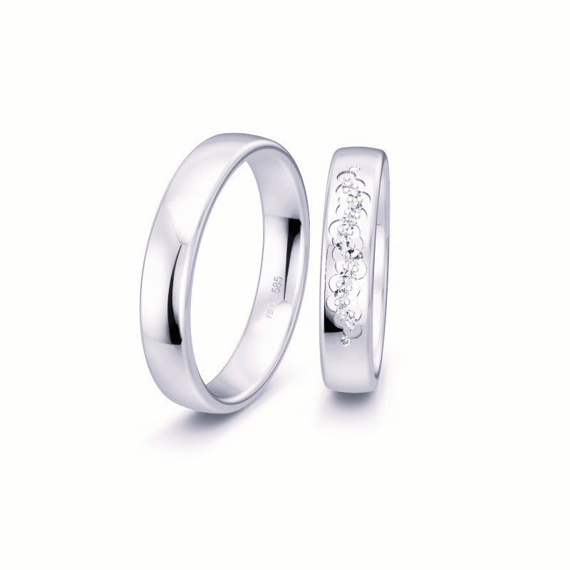 Breuning Renaissance vielsesring i 9 til 14 karat hvidguld med 12 diamanter og 0,129 ct