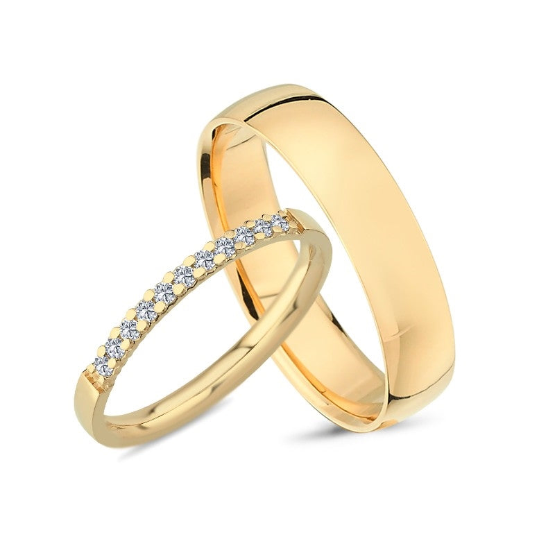 Vielsesringe fra Nuran i 8 kt guld med alliancering og 0,16 ct brillanter
