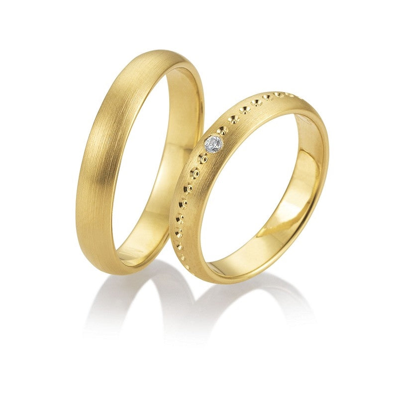 Breuning vielsesringe i 8-14 kt guld m 0,025 ct brillant