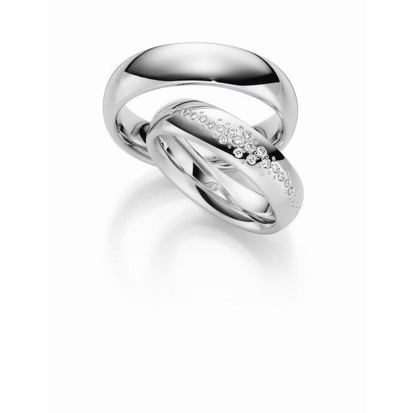 Vielsesringe i hvidguld med 18 brillanter fra Gerstner – brede ringe med elegant diamantmønster