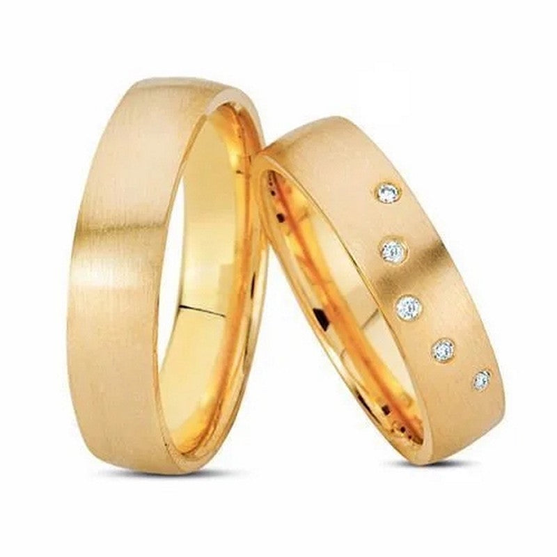 NURAN - Vielsesringe i 8-14 kt. guld m. 5x0,01ct.