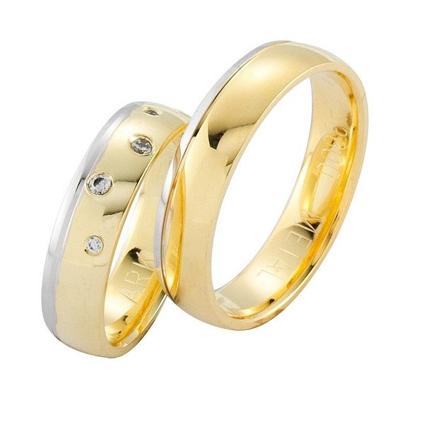 NURAN - Tofarvede vielsesringe i 14kt. guld/hvidguld m. 0,07ct.