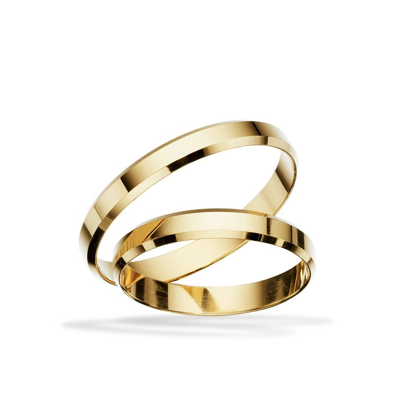 Vielsesringe i blankt guld fra Scrouples med klassisk design og skrå kanter
