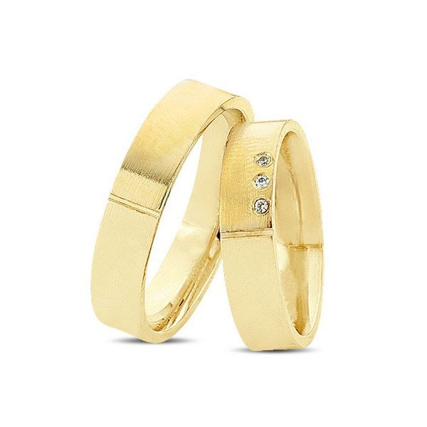 Vielsesringe i 8 kt guld fra Nuran med 3 brillanter og silkemat grafisk design
